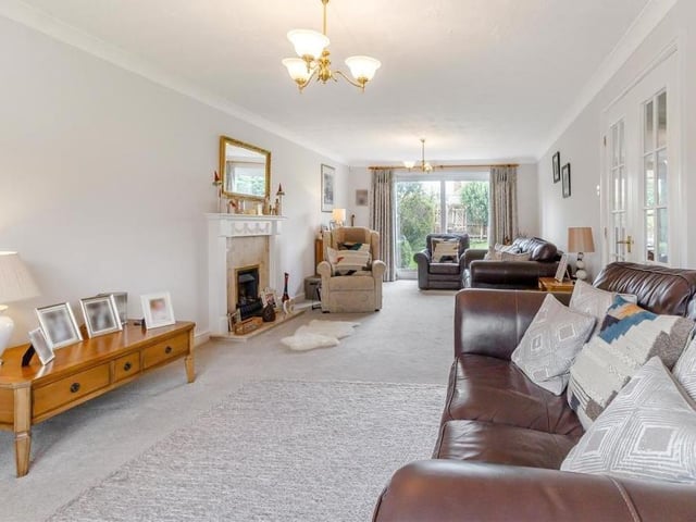 Let's begin our tour of the Granby Avenue house in the extensive lounge, which runs the length of one side of the property. At the far end, a double-glazed, sliding patio door leads out to the back garden.