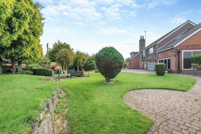 A network of pathways, lawns, shrubs and trees makes the garden such an attractive asset at the £725,000 property.