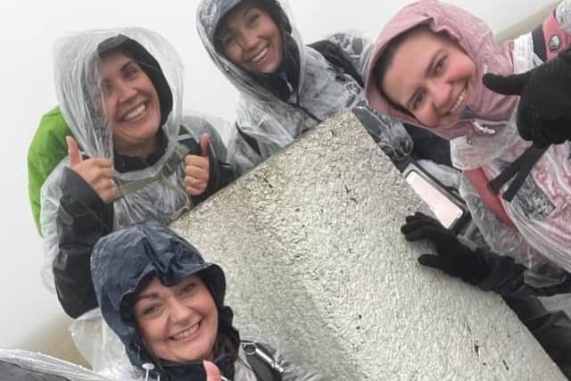 The walkers braved the weather for a good cause.