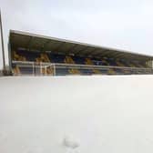 Snow blankets One Call Stadium at the weekend.