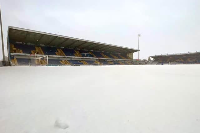 Snow blankets One Call Stadium at the weekend.
