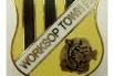 As well as programmes, fans have always loved to collect pin badges, just like this old Worksop Town pin badge.