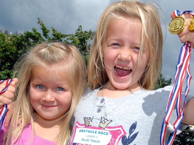 When I think of primary school sports day, the egg and spoon race instantly comes to mind. Photo: Mansfield CVS hosted a Family Fun Day at The Millennium Green in Mansfield Woodhouse. Pictured are Erin Thrall, on the right, and her sister, Matilda, proudly displaying the medals they won during the event for the sack race and egg and spoon race. This took place in 2010.