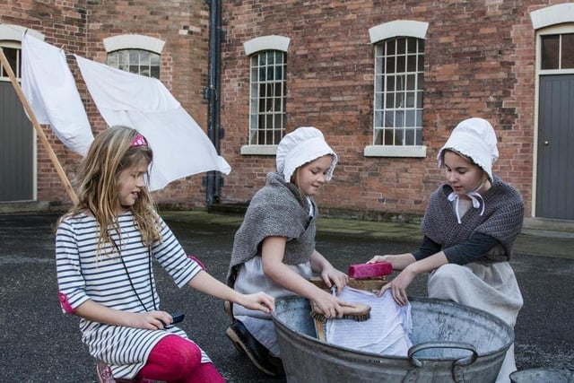 Children get the chance to try on costumes of the day at Southwell's Workhouse Museum, which recreates life for poverty-stricken families back in the 19th century. The austere building is the most complete workhouse still in existence, reflecting a time when the poor had to work in return for food, shelter and medical care.