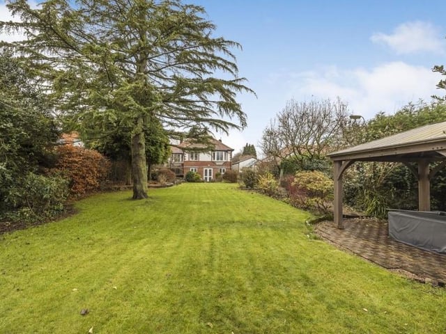 Time now for a couple of photos of the extensive back garden, which is mainly laid to lawn. Fully enclosed, it is a terrific outdoor space, complete with a wooden gazebo and decked area.