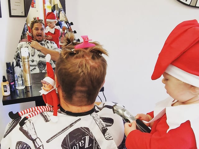 Bubbles the Elf gives her dad a haircut