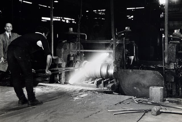 Sam Dunlop working with iron at Codnor Park forge in 1965.