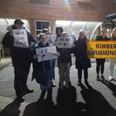 Members of Kimberley Swimming Club demonstrate outside Broxtowe Council ahead of a decision to close the leisure centre. Photo: Other