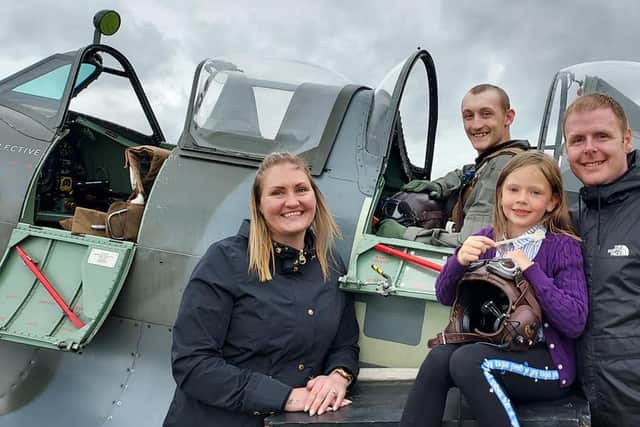 Jacob Fradgley pictured with family during his Spitfire flight at Duxford.
