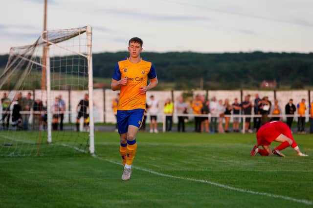Mansfield Town's Jimmy Knowles finds the net.