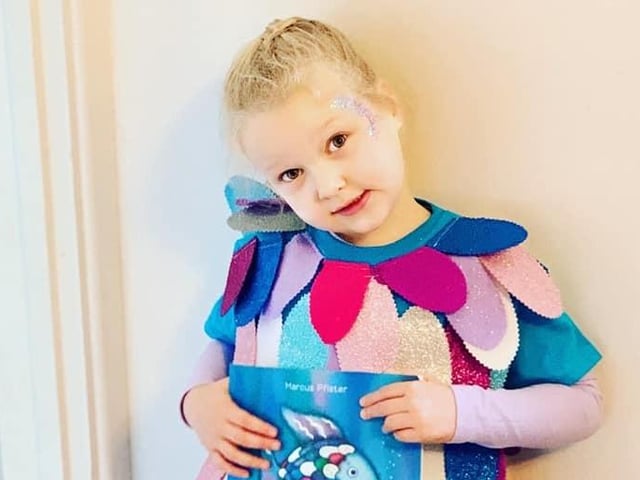 Four year old Gracie-D, from Sutton in Ashfield. as Rainbow Fish in a handmade outfit