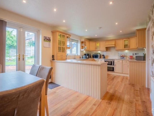 There's plenty of space for a dining table and chairs in the kitchen/diner, while doors open out on to the garden.