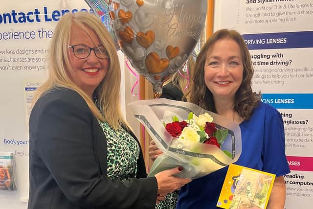 Helen Bamforth (left) presenting gifts to Dianne Kerrison (right).
