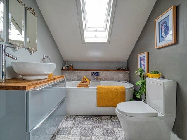 The main bathroom at the £475,000 property is described by estate agents eXp as "a work of art". It resembles a tranquil spa, with Jacuzzi bath, wash hand basin, WC and natural light bursting through the skylight.