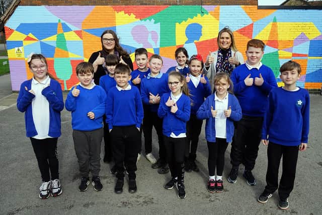 Children at Somerlea Park Junior School in Somercotes celebrating its 'Good' Ofsted rating with executive head teacher Helina Kirkup and head of school, Daisy Rizo.