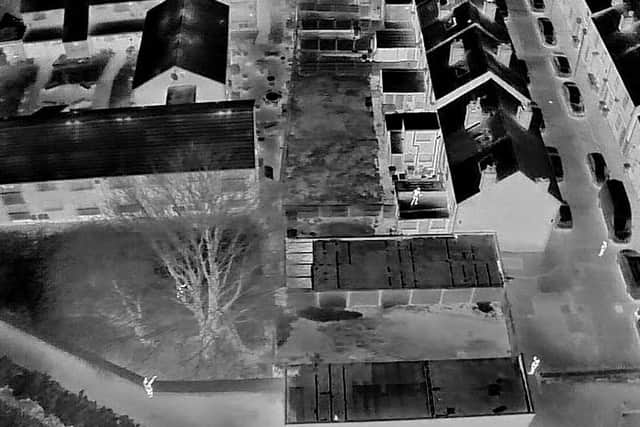 This suspect was found hiding in a garden by the drone