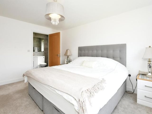 The master bedroom, which faces the back of the Langwith house, is the biggest of the four. It boasts a carpeted floor, radiator and access to an en suite shower room.