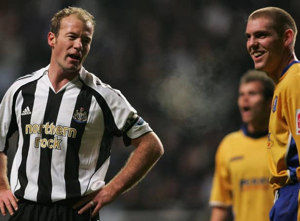 Alan Shearer exchanges words with Jake Buxton of Mansfield. Photo: Getty.
