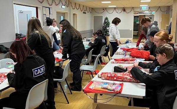 Police cadets helped wrapped presents for Bags of Blessings to hand to deprived children. Photo: Nottinghamshire Police