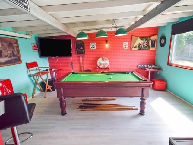 The 'man cave' even includes this games room, complete with pool table.