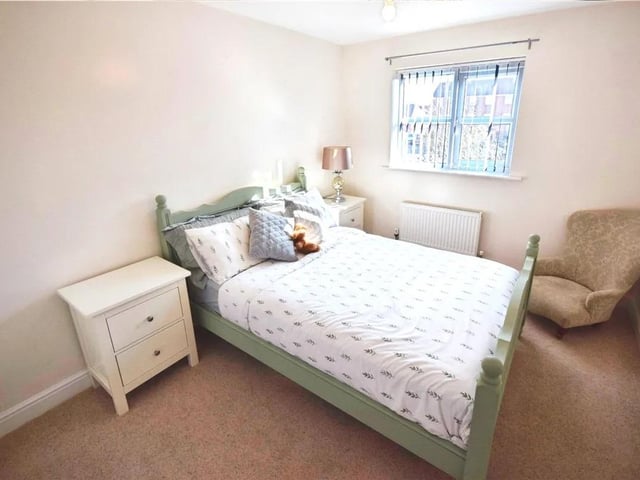 The property boasts ample bedroom space for a growing family.