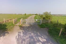 A gate with fly-tipping notices on Norman Road, Somercotes. Picture: Google Maps
