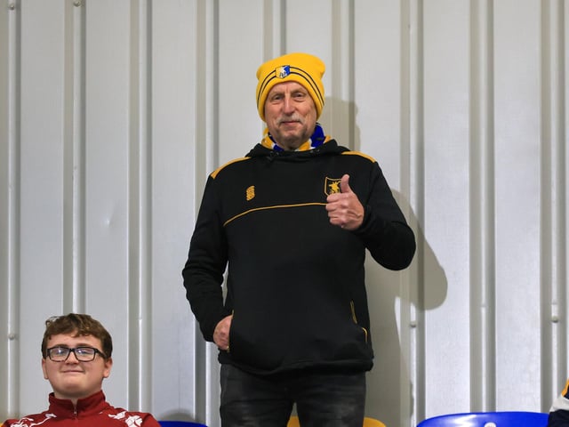 Travelling Mansfield Town fans during the Sky Bet League One match against AFC Wimbledon at Stadium Plough Lane.