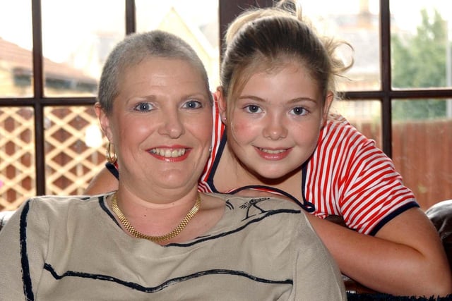 Amy Beatson (11) with her mum Claire who is battling with Breast Cancer at their home in Beighton, pictured in 2003