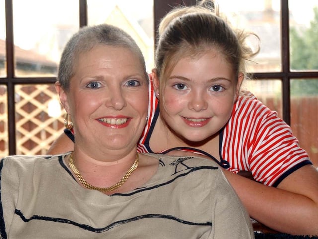 Amy Beatson (11) with her mum Claire who is battling with Breast Cancer at their home in Beighton, pictured in 2003