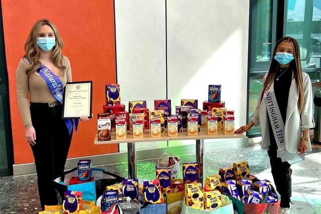 Nikita Wilson (left) and Jasmine Allsop (right), of Mansfield, with dozens of Easter eggs that they collected to hand to the children's wards at King's Mill Hospital in Sutton.,