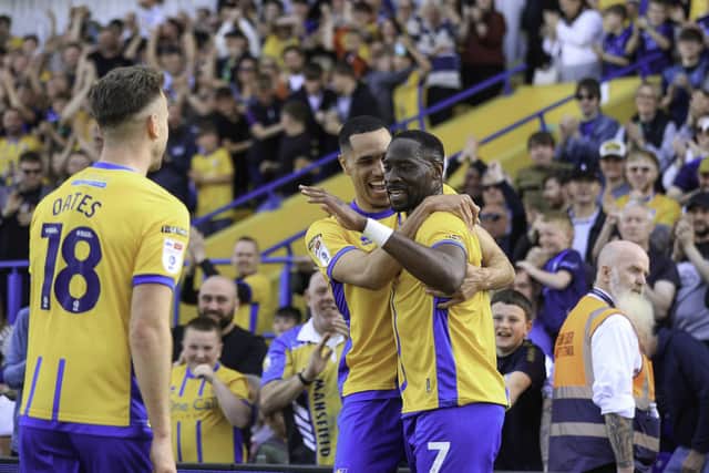 Mansfield Town forward Lucas Akins (07) celebrates his first half goal with Jon Russell (13) during the Sky Bet League 1 match against Cardiff City FC at the One Call Stadium,02 May 2026, Photo credit Chris & Jeanette Holloway / The Bigger Picture.media