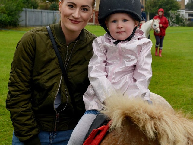 Summer Festival at Carr Lane Park, Warsop, having a pony ride is Athena Garratt, three pictured with Mum Lily Riedel