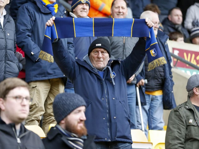 Travelling Stags fans watch the Sky Bet League 2 match against Bradford City.