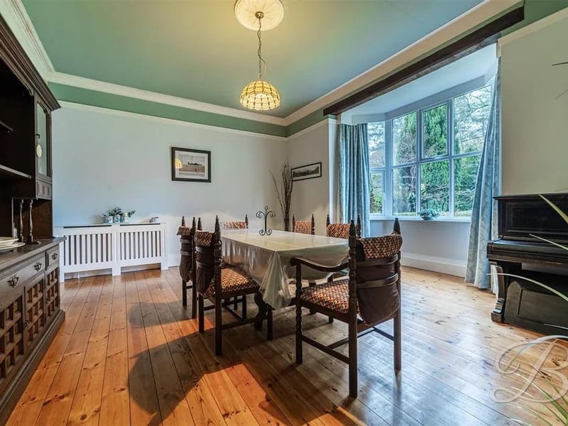 Spacious reception room currently lending itself as a dining room but has the flexibility to fit the new owners needs. Fitted with a feature fireplace and a bay window to the front elevation, this room has wooden floor throughout and gorgeous high ceilings.