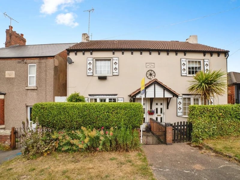 This delightful two-bedroom cottage is brimming with charm and character, offering generous living space and a beautifully maintained rear garden.