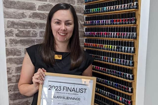 Beauty therapist Alanya Jennings, of Mansfield, with the certificate that proves she is a finalist in the UK Hair and Beauty Awards.