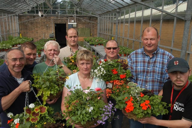 Horticultural students from Portland College pictured with some of the hanging baskets sold during the college's Horticultural Fair in 2007.