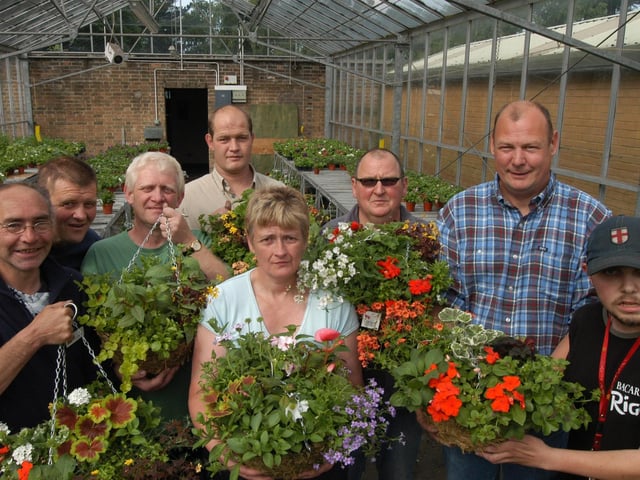 Horticultural students from Portland College pictured with some of the hanging baskets sold during the college's Horticultural Fair in 2007.