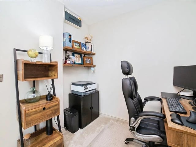 One bedroom is currently used as a home office.