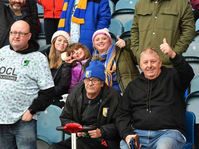 Mansfield Town fans watch the brilliant win at Peterborough United.