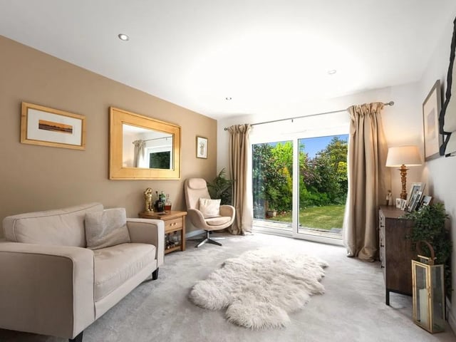 This useful additional snug is another versatile setting providing the perfect room for relaxation or a dedicated office space for those working from home. There is also the potential to create a ground-floor fourth bedroom here. The sliding patio door opens out into the garden.