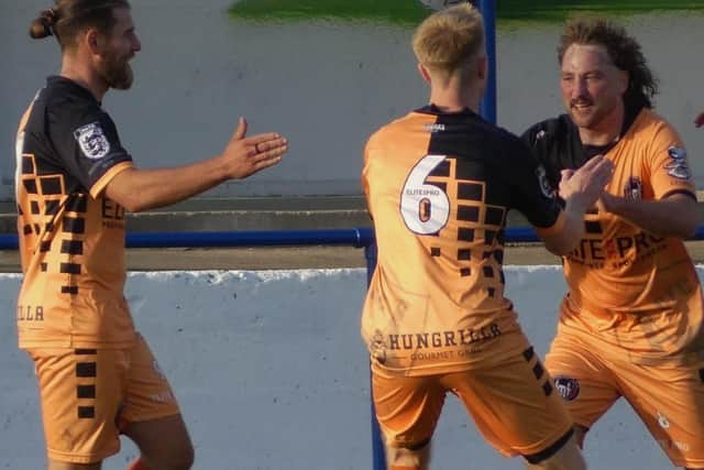 Mike Williams celebrates his late winner. Pic: Martin Roberts.