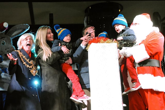 Mansfield's Mayor Kate Allsop joins the Radford family to switch on the Christmas lights at the end of the extravaganza in the Market Place