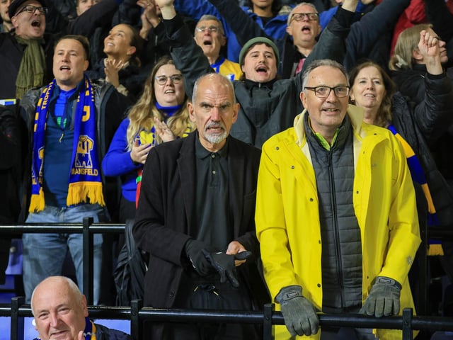 Travelling Mansfield Town fans during the Sky Bet League One match against AFC Wimbledon at Stadium Plough Lane.
