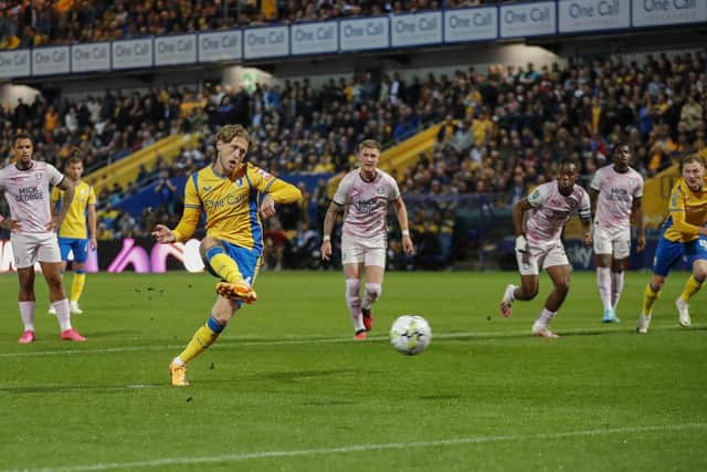 Will Swan tucks away his early penalty during the Carabao Cup 3rd round match against Peterborough United FC at the One Call Stadium, 26 Sept 2023  
Photo credit : Chris & Jeanette Holloway / The Bigger Picture.media