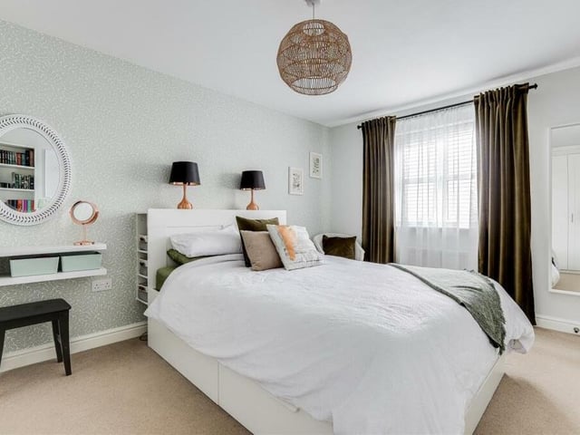 The largest of the four bedrooms on the first floor of the £325,000 house is this impeccable master. Overlooking the front of the property, it has a carpeted floor and access to an en suite shower room.