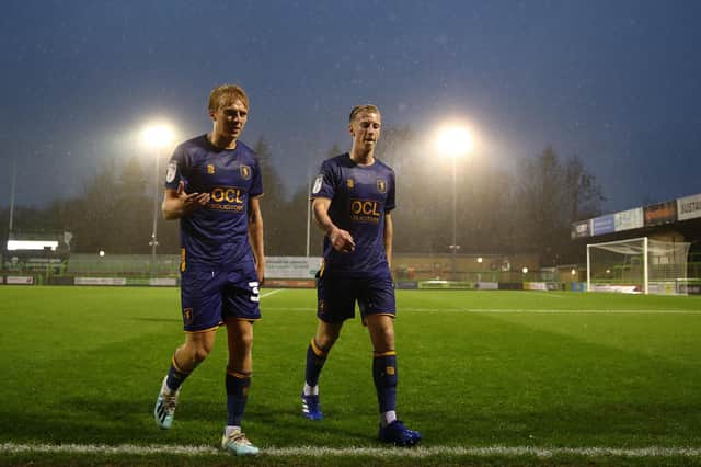 Mansfield goalscorers George Lapslie (L) and Harry Charsley head for the warmth of the changing room at half time of the Sky Bet League Two match between Forest Green Rovers and Mansfield Town at The New Lawn. (Photo by Michael Steele/Getty Images)