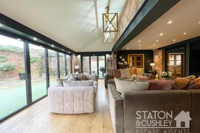 The open-plan lounge at the £725,000 property can be described as bright and beautiful.
