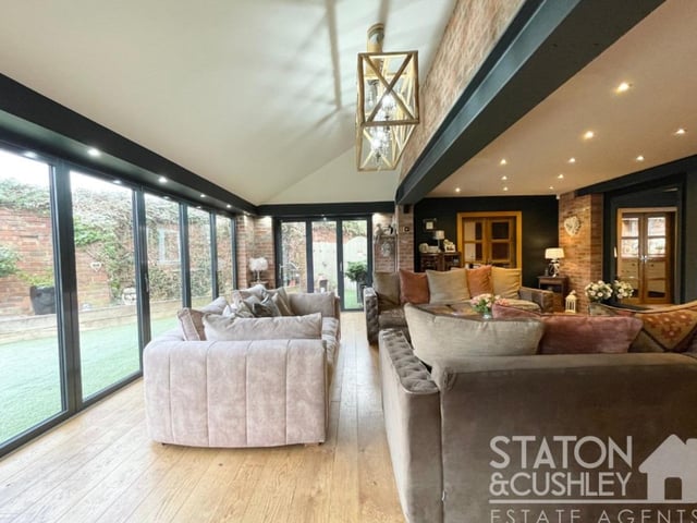 The open-plan lounge at the £725,000 property can be described as bright and beautiful.