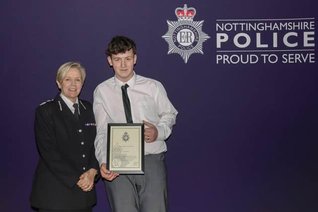 Chief Constable Kate Meynell with Harvey and his award